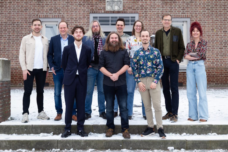 Groepsfoto eerste 10 met sneeuw